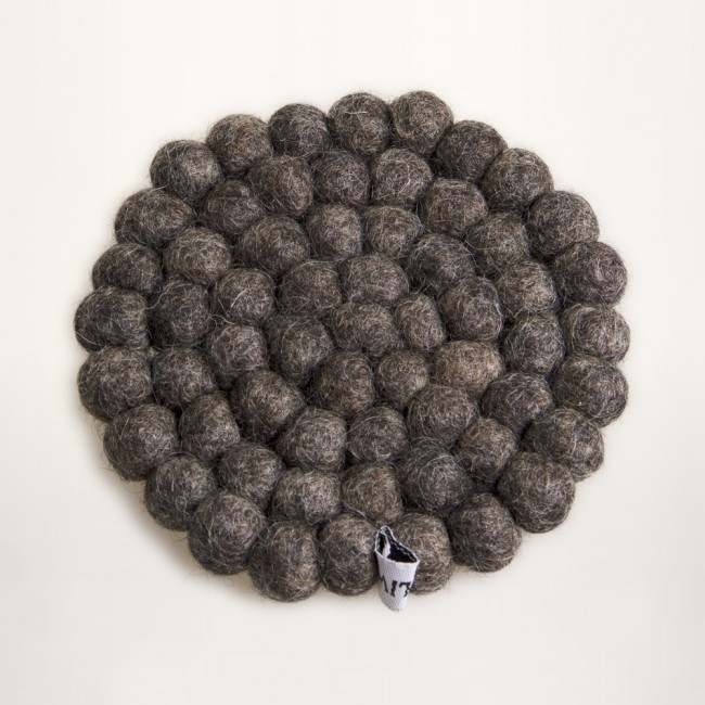 gray coaster of felt balls