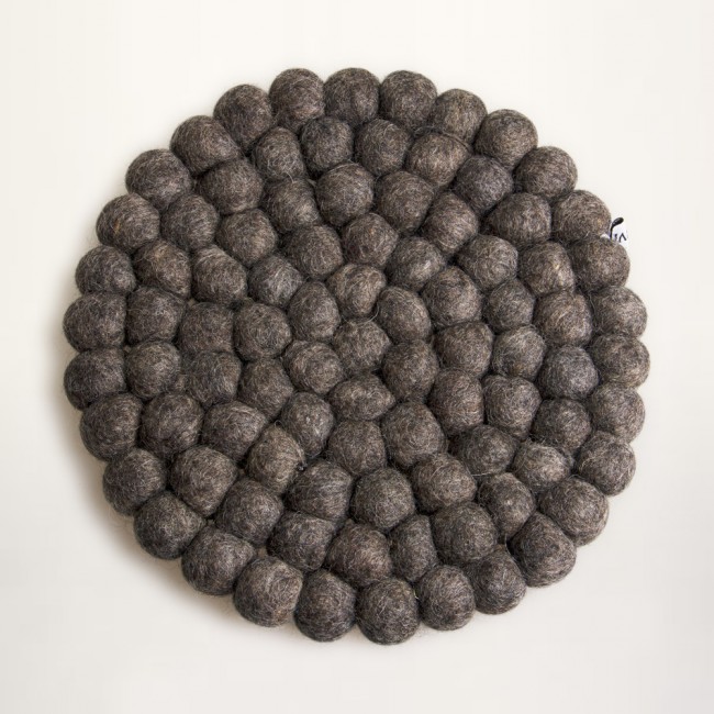 grey trivet of felt balls