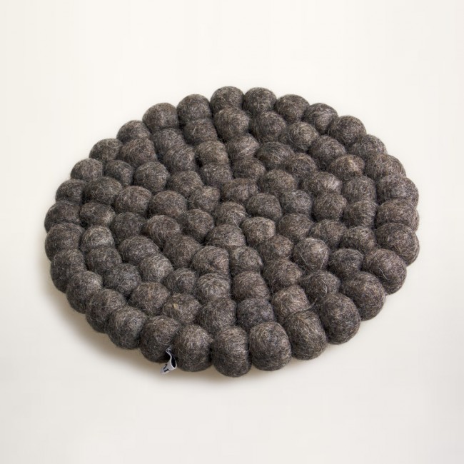 grey trivet of felt balls