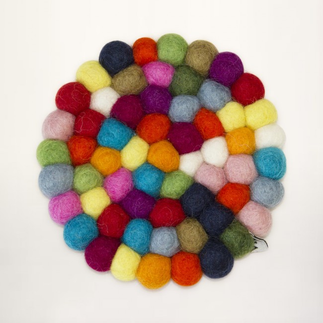 multicolored coaster of felt balls