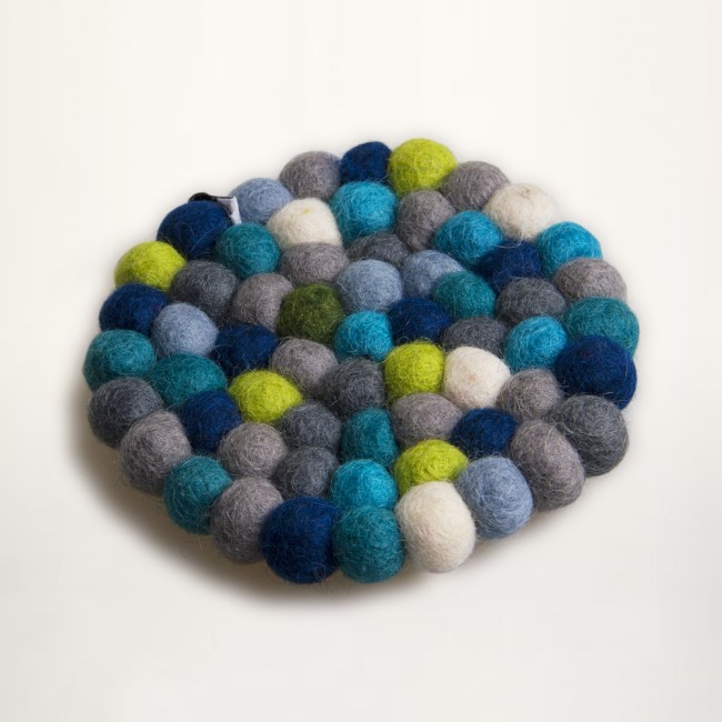 blue and green coaster of felt balls